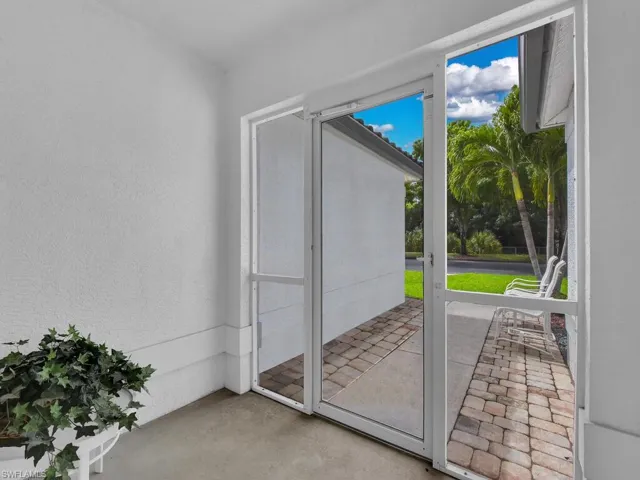 Screened in porch at front entry