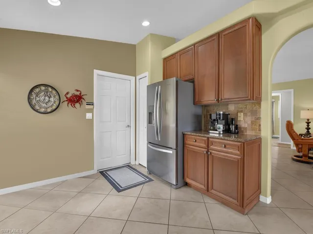 Kitchen w/coffee bar open to Living Room/Dining Area