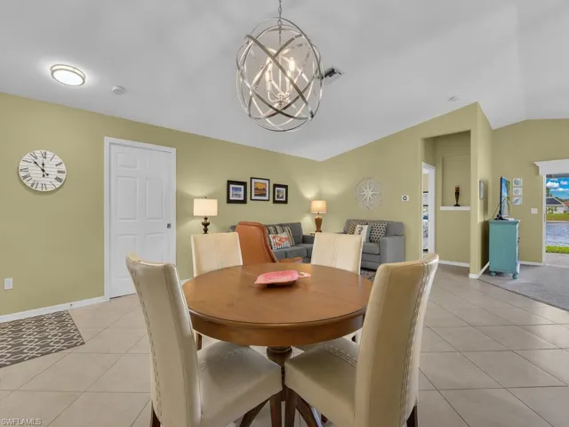 Dining Area close to Entry and Kitchen - pocket door separates guest rooms from the rest of the home for added privacy
