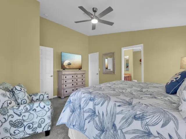 Primary Bedroom featuring walk-in custom closet