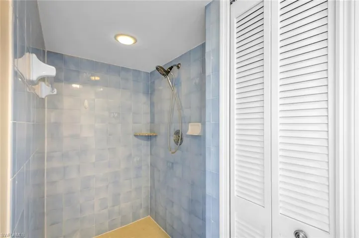 Bathroom with a tile shower