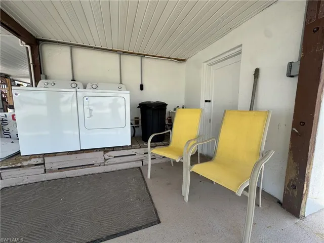 Laundry area featuring independent washer and dryer