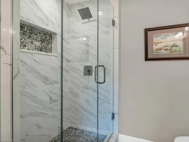 Bathroom featuring an enclosed shower