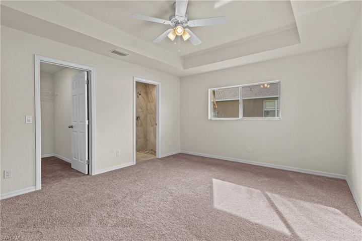 Features spacious walk-in closet.