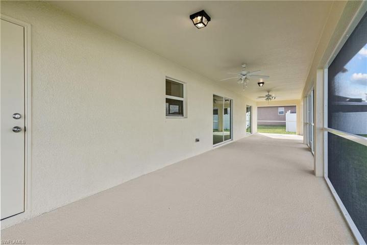 Guest bath opens onto screened Lanai.