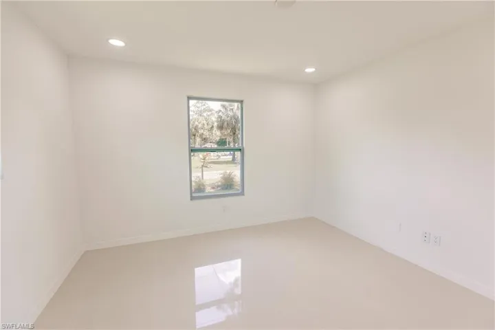 Empty room with tile patterned floors