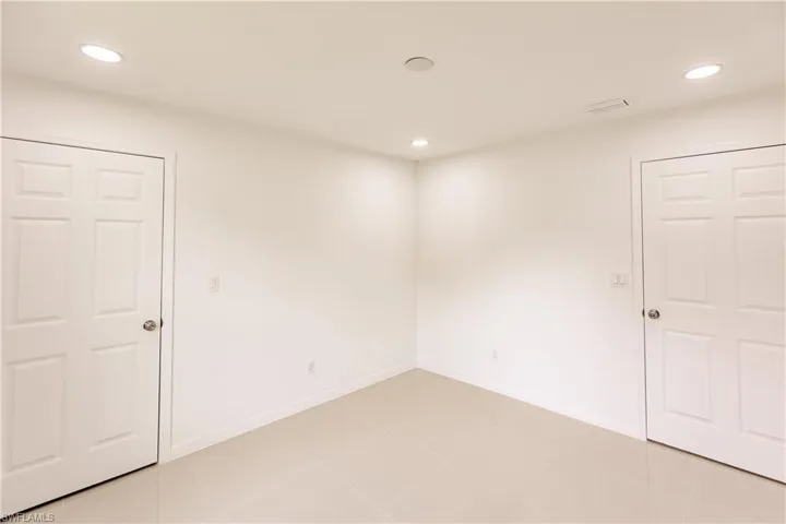 View of tiled spare room