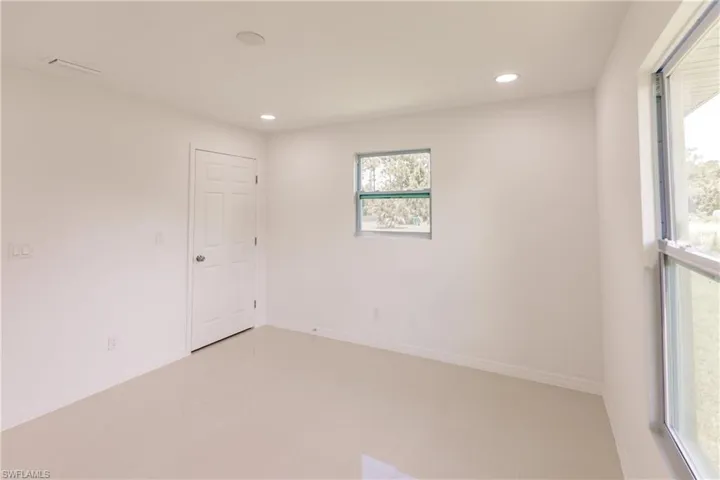 Empty room with tile patterned flooring