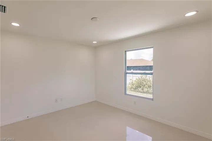 View of tiled spare room