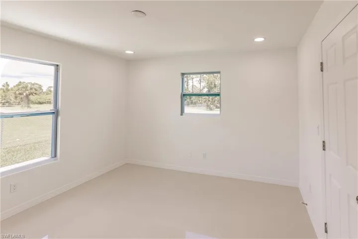 Unfurnished bedroom featuring tile patterned floors