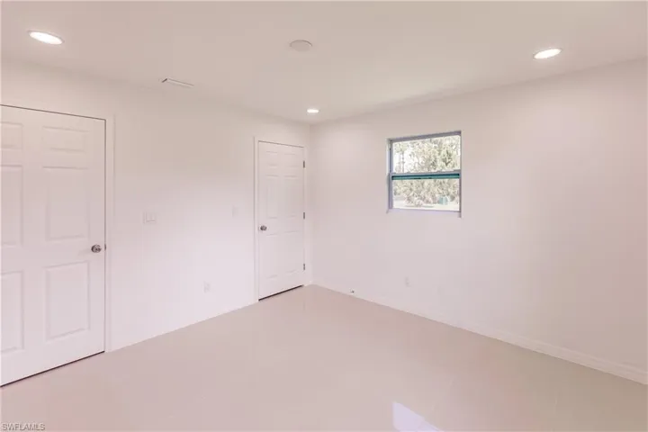 Unfurnished room with tile patterned flooring