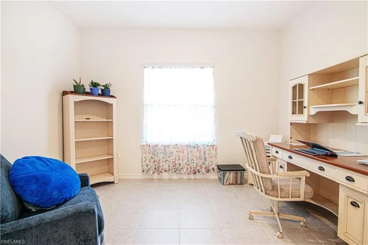 Office featuring light tile patterned floors