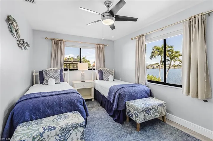 Guest Bedroom with 2 Twin size beds and flatscreen tv