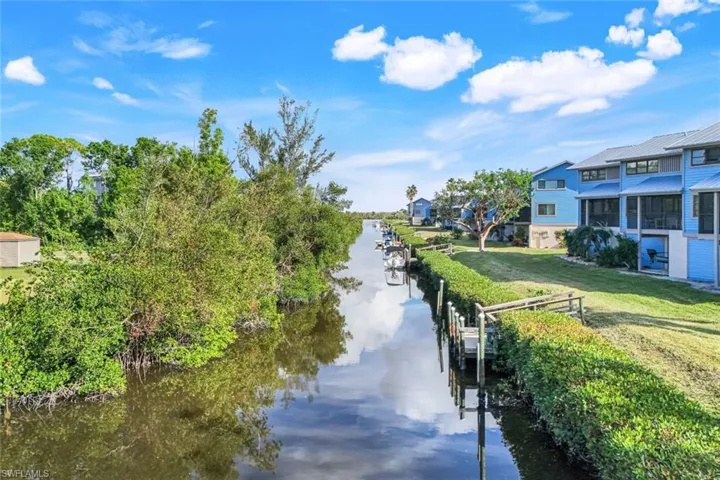 Water view featuring a dock