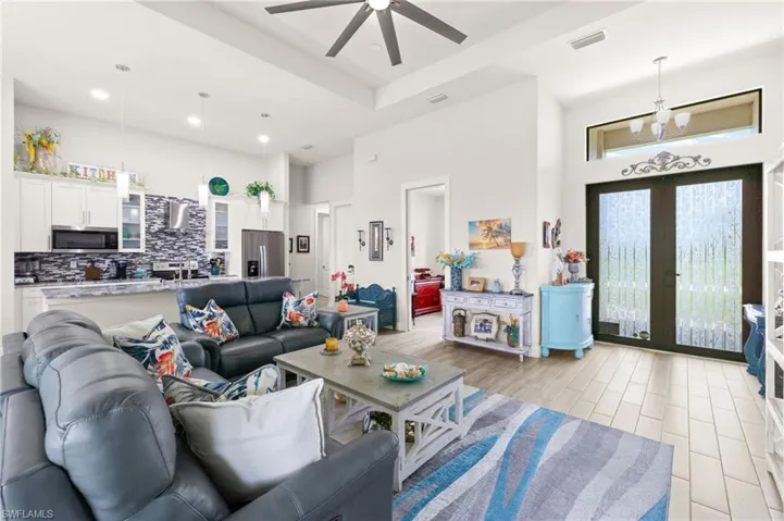 Entryway with french doors and wood finished floors