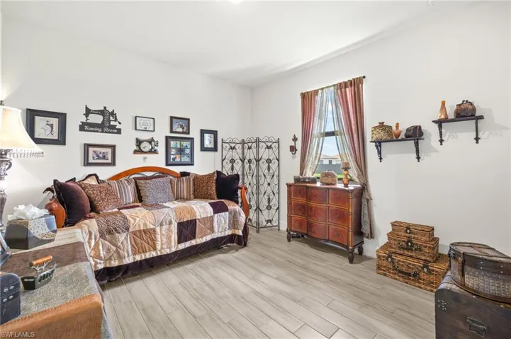 Bedroom with light wood-type flooring