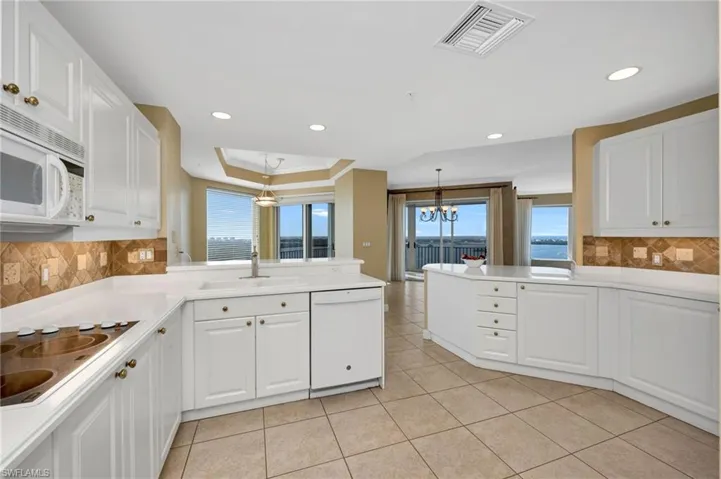 Open kitchen to breakfast, dining, great room.