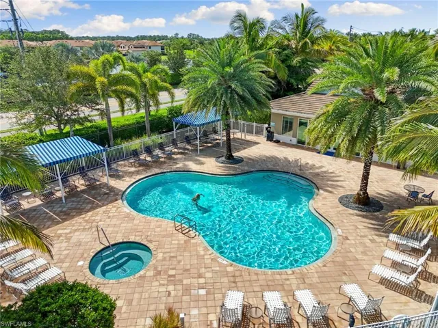 Community pool with a gazebo and a patio area