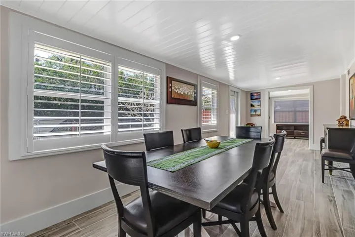 Dining space featuring light wood finished floors and baseboards