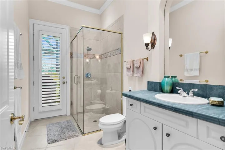 Full Bath with door to Lanai, next to Guest Bedroom