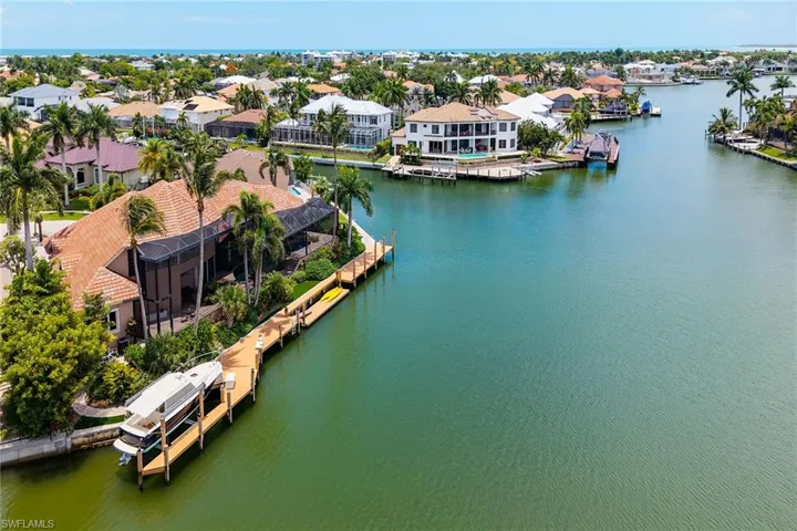 Aerial of home with wide water & bay views