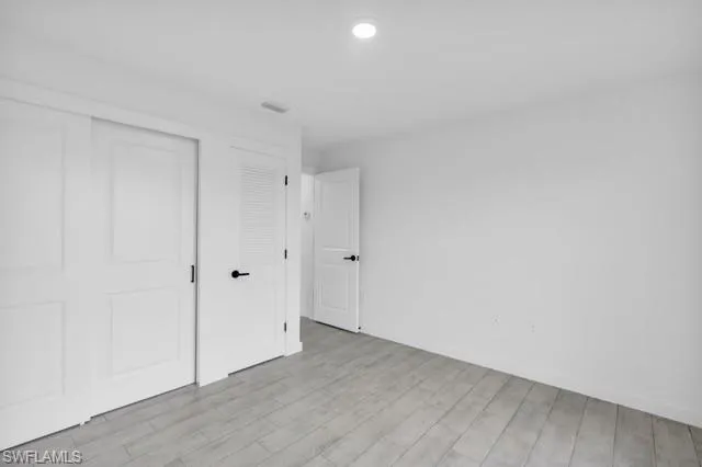 Bright interior space featuring light wood-finish flooring