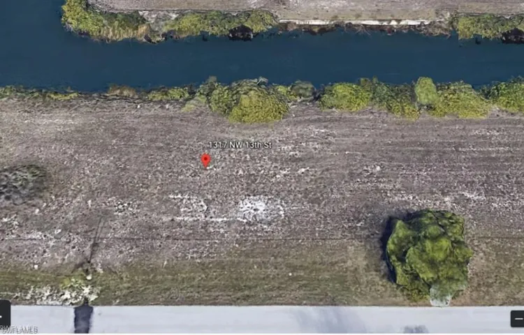 Aerial view of property's location featuring a nearby body of water