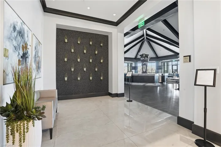 Clubhouse lobby featuring beamed ceiling