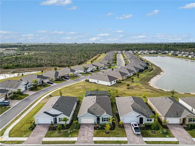 Aerial view of residential area with a nearby body of water