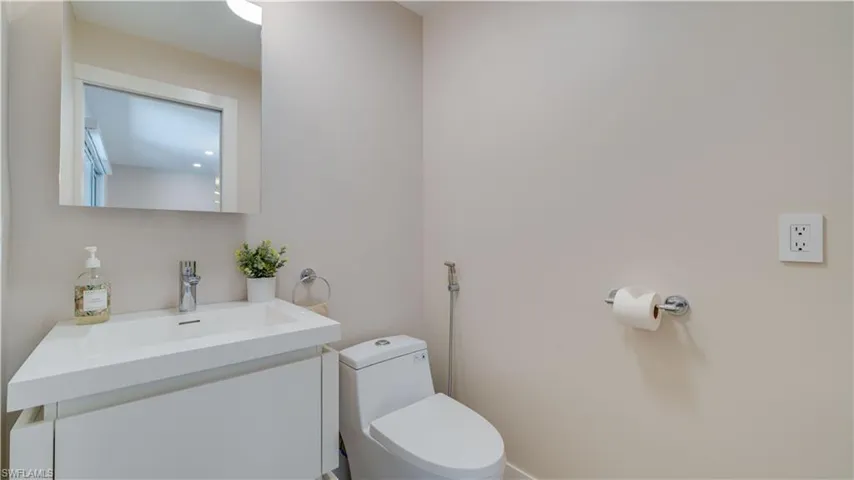 Bathroom with vanity and toilet