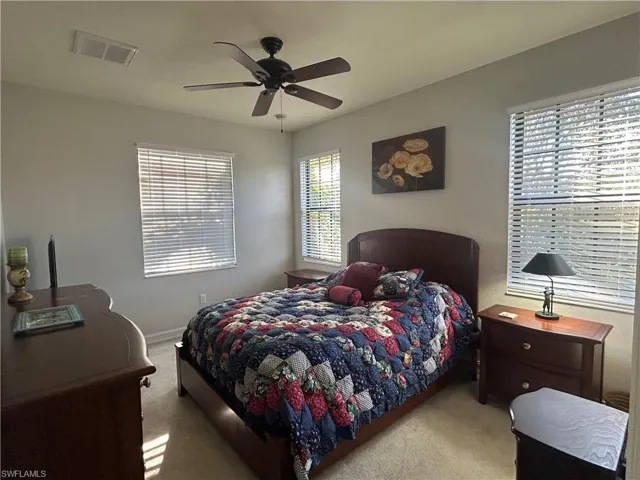 Bedroom featuring carpet floors and a ceiling fan