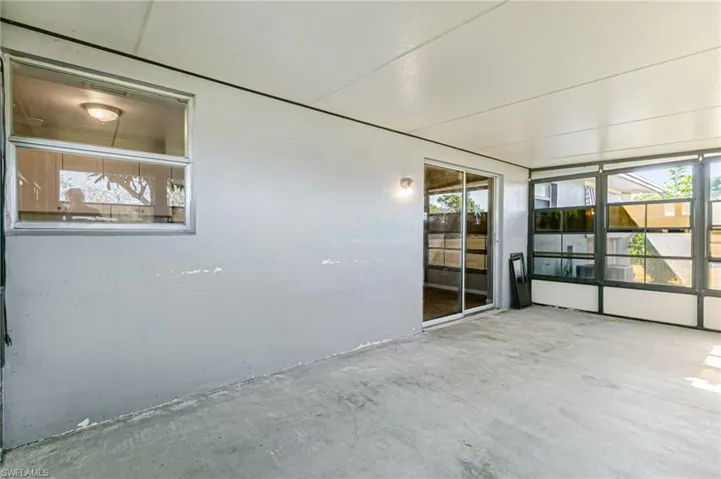 Unfurnished sunroom with plenty of natural light