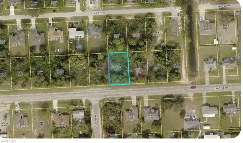 Aerial view of property's location featuring property parcel outlined
