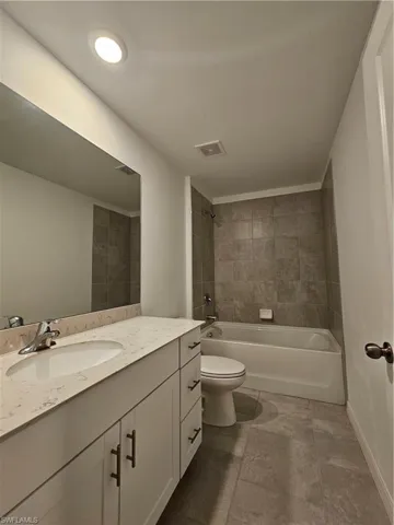 2nd bathroom,  lots of countertop space with a large linen closet inside bathroom behind the door.