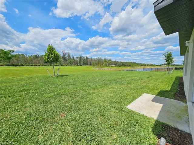 Look at the back yard view with an extended area for back yard fun!
