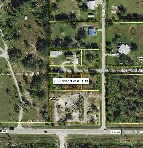 Aerial map of property and surrounding area with property boundaries highlighted