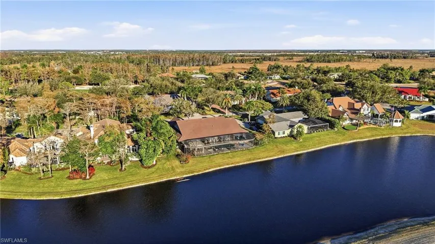 Home sits on a private interior street with easy access to the front gate. Expansive lake to golf course views from this home.