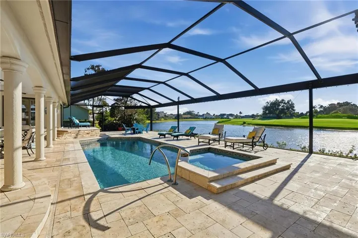 Heated pool and spa (newly re-surfaced and tiled), pool heater and pump only 2-years old, New cage with super screen, fire pit stays with home.