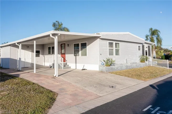 View of front of home featuring a carport