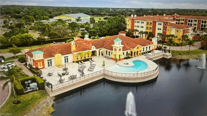 Aerial view of a large body of water and a pool area