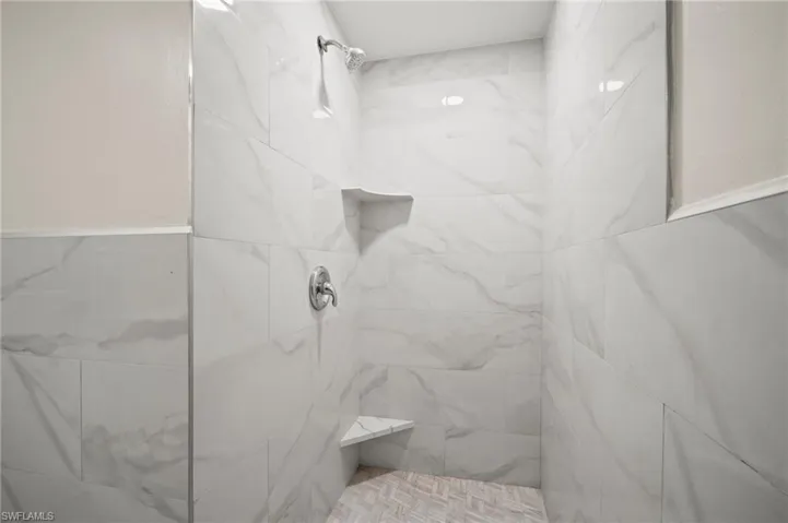 Bathroom with tiled shower