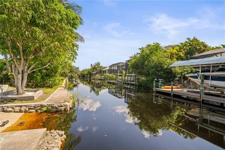 Dock featuring a water view and boat lift