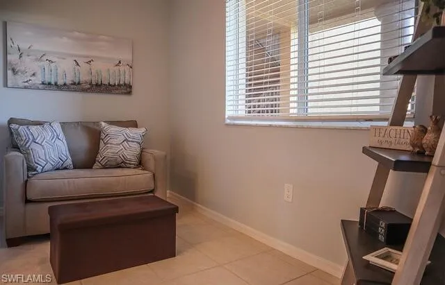 Bathroom featuring vanity, shower / bath combination with glass door, and recessed lighting