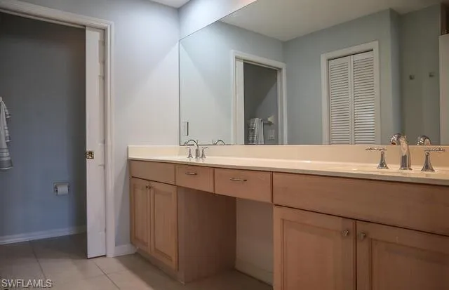 Bedroom with dark wood-type flooring and access to outside