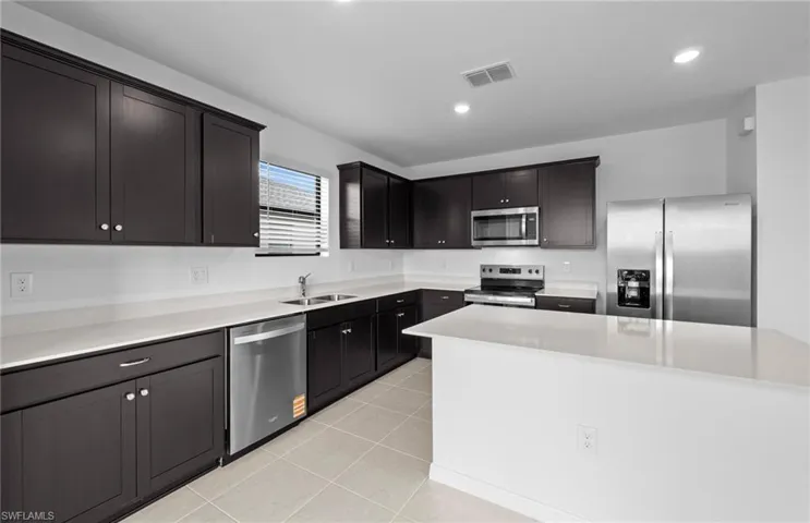 Photo depicts the actual home available for sale.