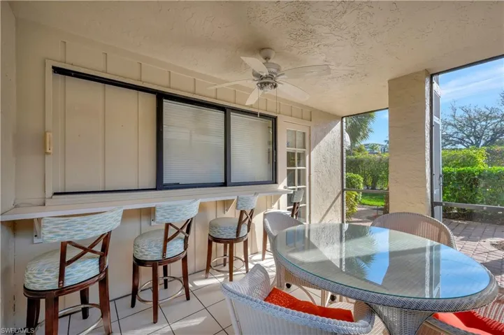 Large Screened Covered Patio and Bar off the kitchen
