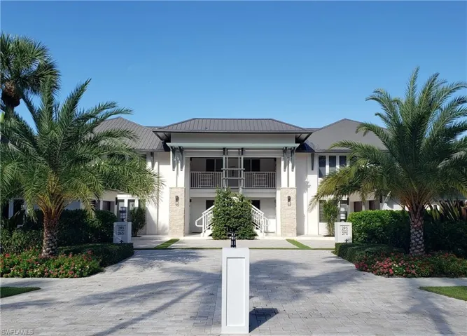 Garage is to the right behind the palm. Unit is on upper right, opposite side from 5th Avenue, additional parking space to right of building