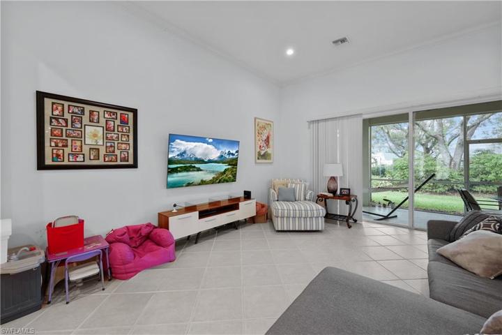 Sliders across great room provide great light and enhance open feel.