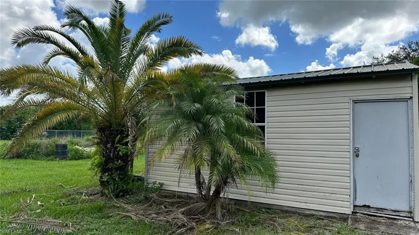View of home's exterior featuring a metal roof