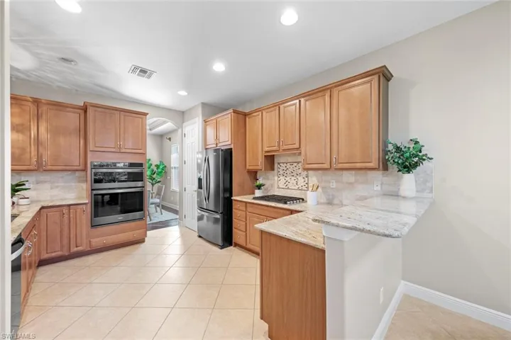 Lots of cabinet space and a breakfast bar